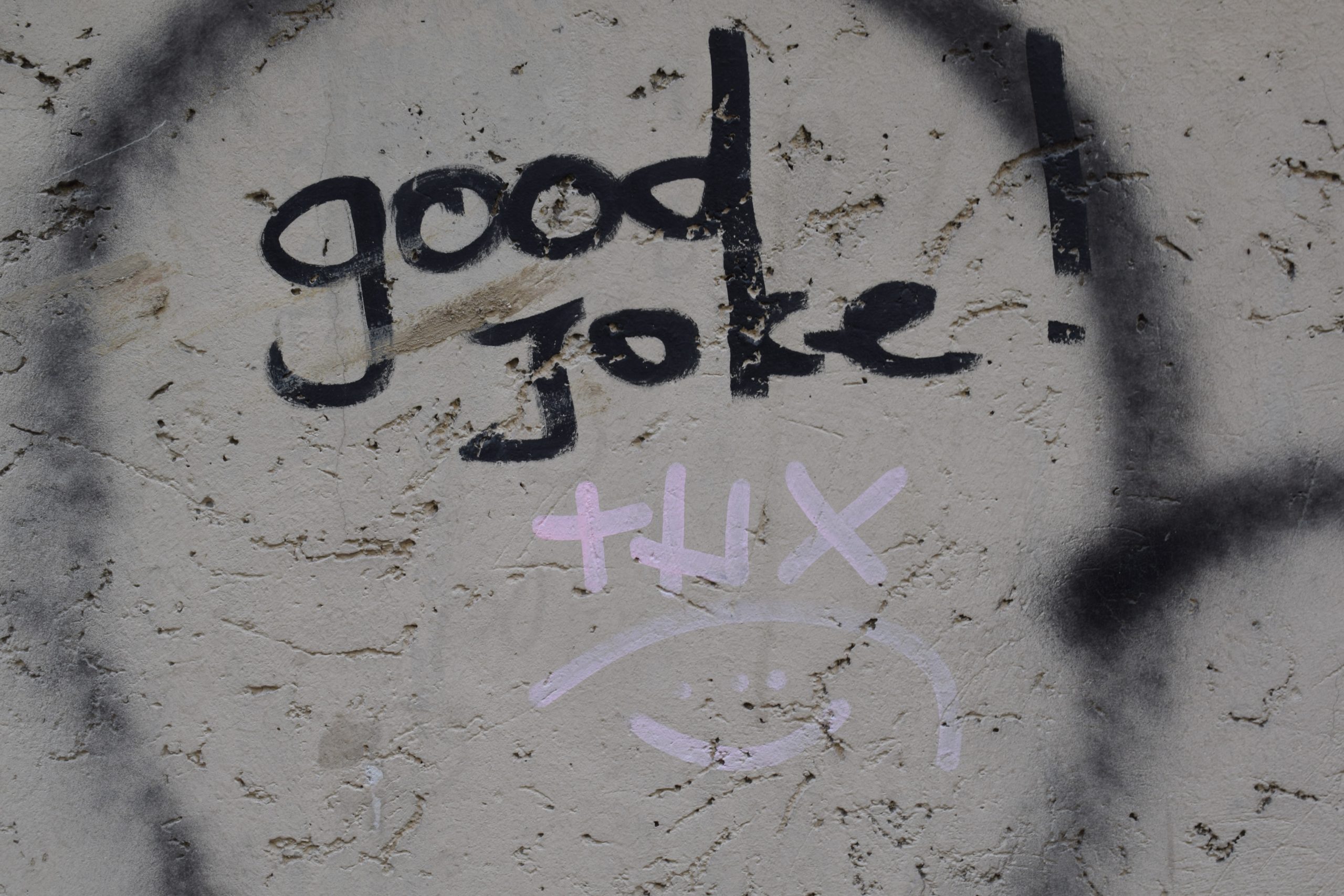 Marker drawing on surface that says: Good Joke, Thx